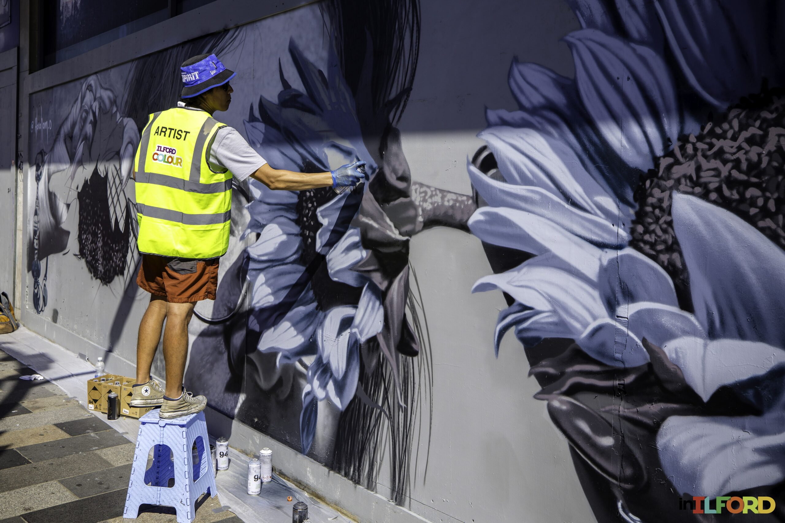 Visitors watching live painting in Ilford